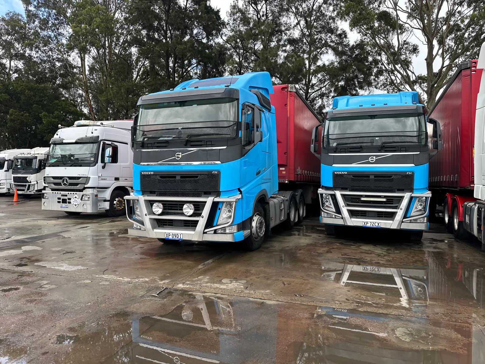 Pristine white semi-truck on a scenic highway